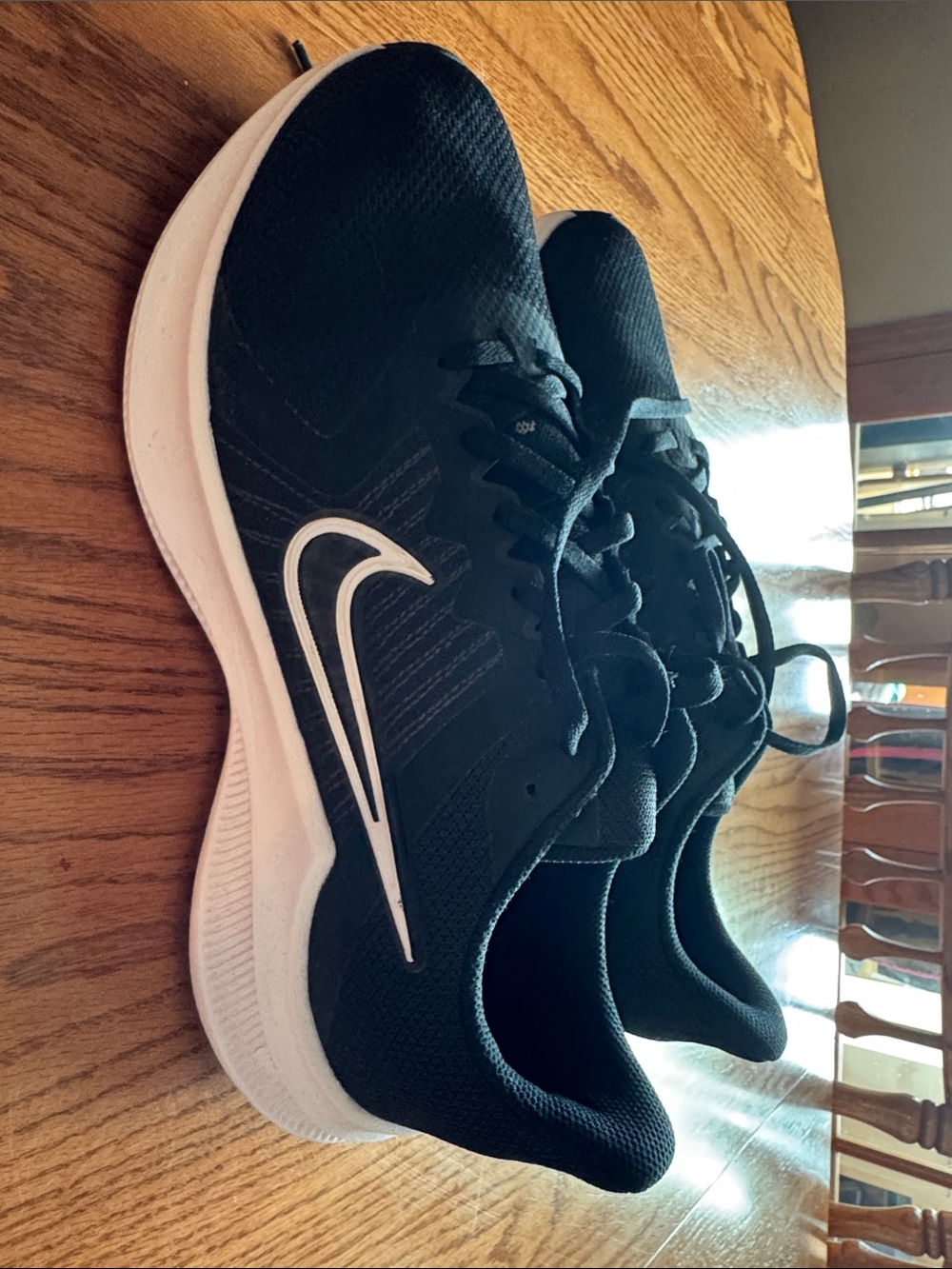 Nike Black Athletic Running Shoes with White Swoosh